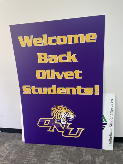 An image of a purple "Welcome Back" ONU sign.